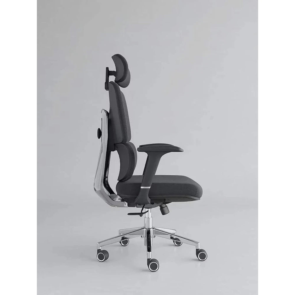 Neva Axis black padded chair in side view, showing the curved back profile and under-seat lever