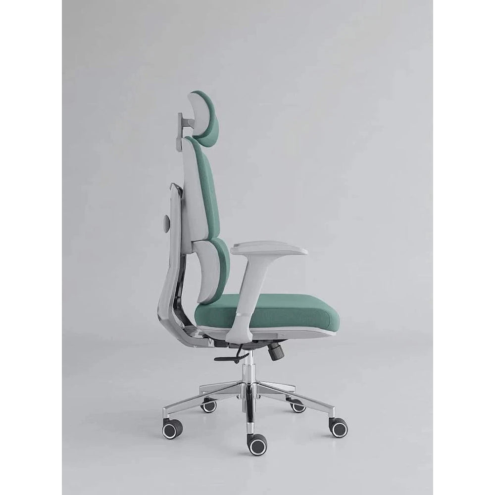 Neva Axis green padded chair in side view, showing the light-coloured back shell and arm supports