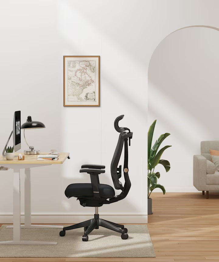 Neva Furniture BS14 ergonomic office chair in black mesh with adjustable lumbar support and headrest.