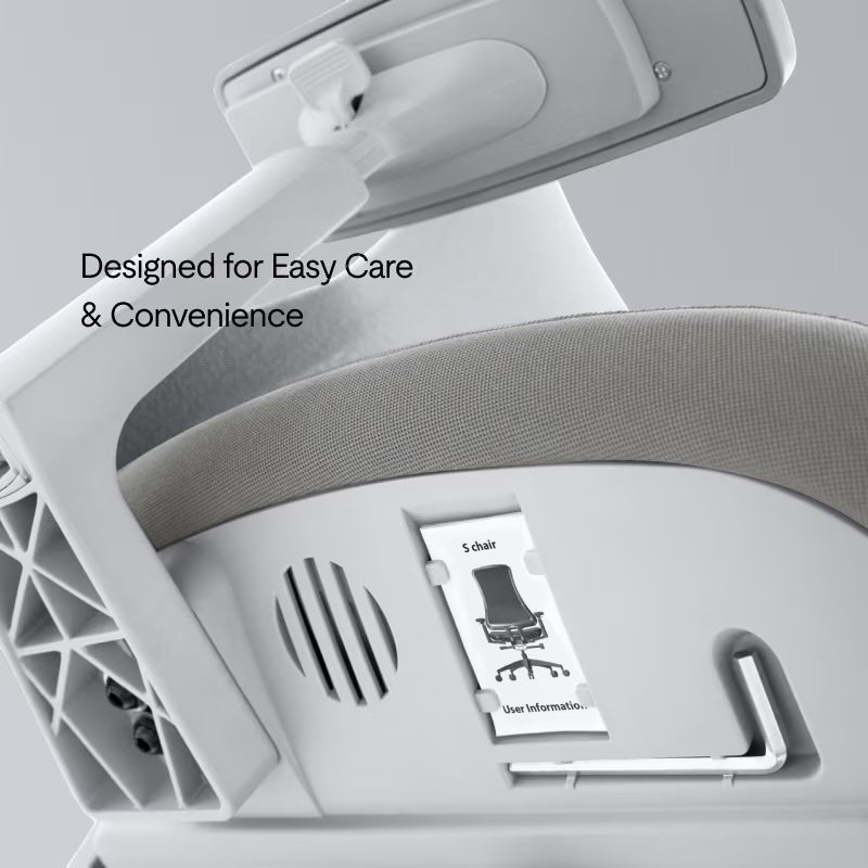 Neva Furniture Sheer ergonomic office chair in white with gray mesh seat, featuring adjustable armrests and a user information slot.