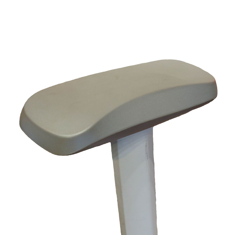 Neva X-Air contoured grey arm pad and pale upright, isolated from the genuine close-up photograph.