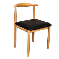 Wooden chair with a black cushion on a white background