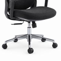 Chrome five-star base and black caster wheels of the black Neva Curve chair.