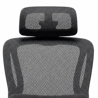 Black mesh headrest and upper backrest of the Neva Curve chair.