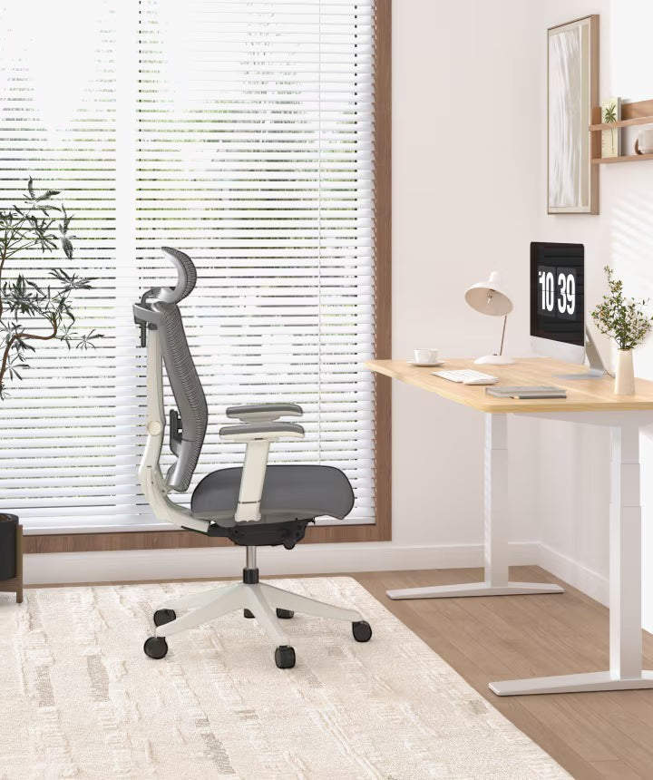 Neva Furniture ergonomic office chair in grey and white with adjustable lumbar support, headrest, and armrests.