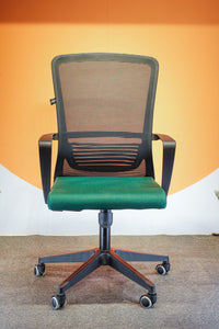 Neva Furniture Vibe Chair with black mesh back and green cushioned seat, featuring adjustable height and tilt lock.