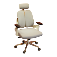 Neva Prime ergonomic office chair, White variant, three-quarter front view with padded split backrest and chrome base.