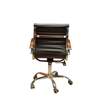 Neva Sit Black office chair, rear view with polished side rails, rear crossbar and single visible side paddle