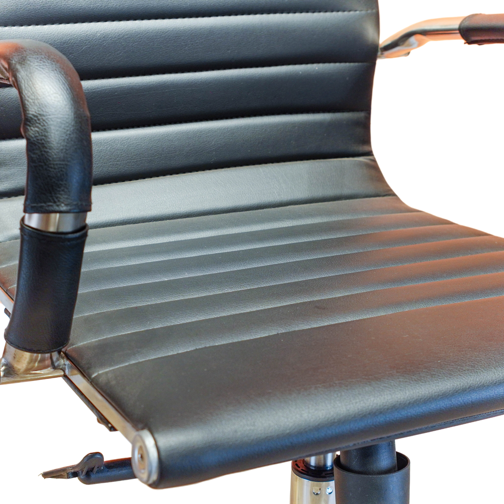 Neva Sit Black office chair, close-up of the stitched seat, rolled front edge and padded arm