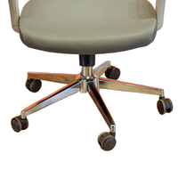 Neva X-Air five-spoke chrome-finish base and plain black twin-wheel castors, with the lower seat edge visible in the genuine front photograph.