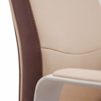 Neva Vale Chair PU-leather upholstery and fixed armrest detail